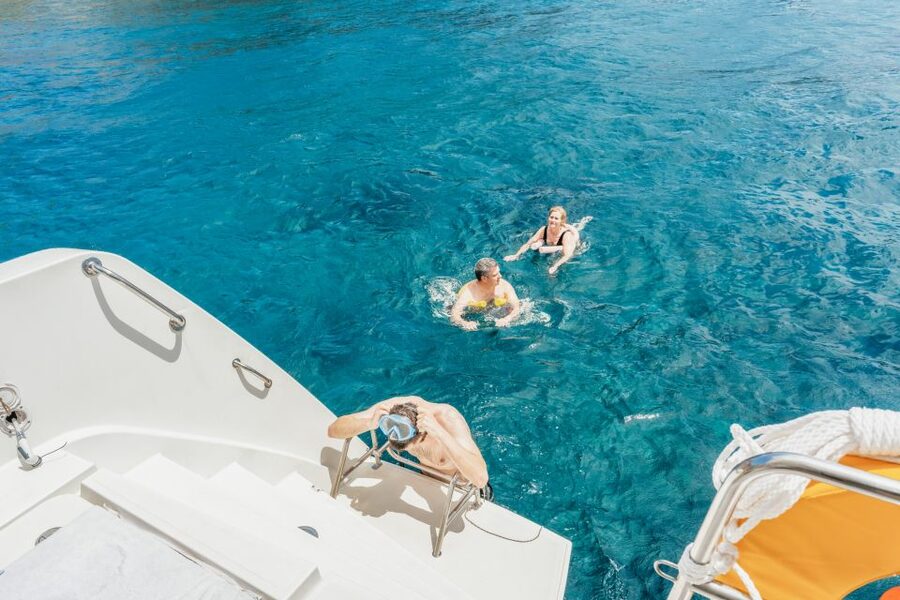 Santorini: Luxury Catamaran Day Trip with Meal and Open Bar - What the $129 price really covers