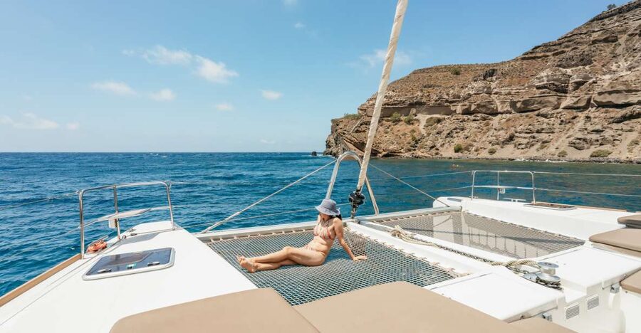 Santorini: Luxury Catamaran Day Trip with Meal and Open Bar - Why seeing Santorini from the sea changes the day
