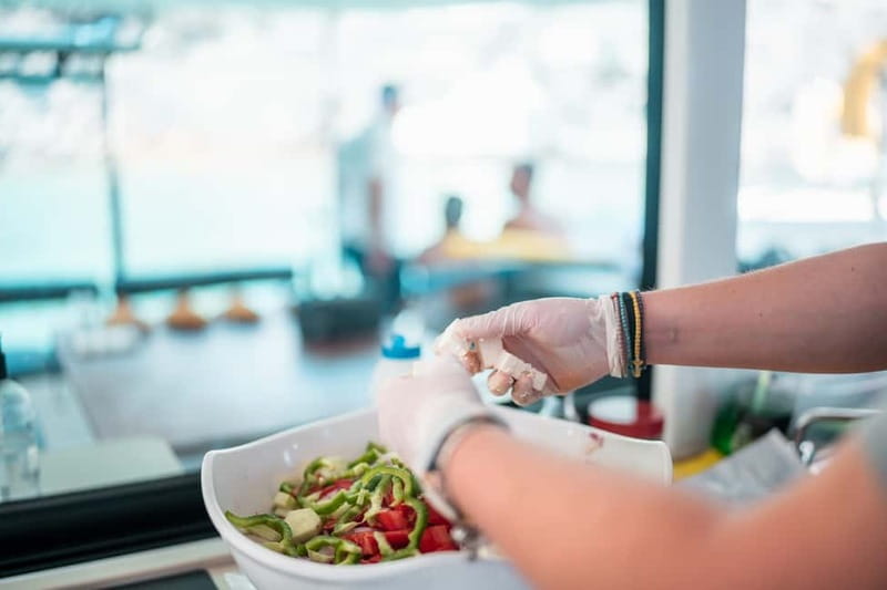 Santorini: Majestic Catamaran Cruise with Meal and Drinks - Greek food, BBQ, and the open bar