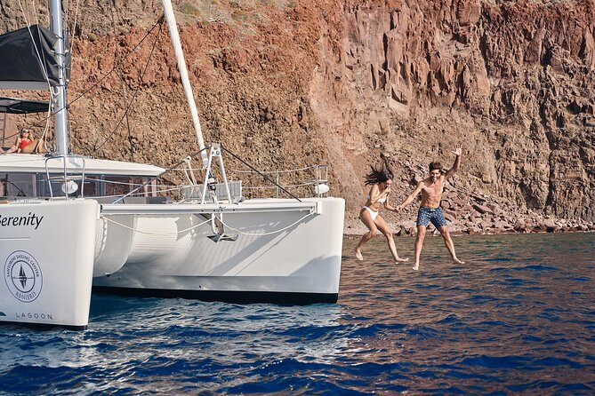 Santorini Oia: Private Sunset Catamaran Cruise with BBQ & Drinks - White Beach, Red Beach, and lunch on board