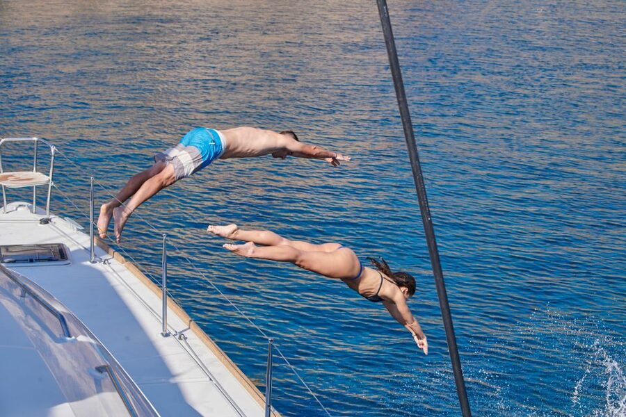 Santorini: Platinum Catamaran Cruise w/ BBQ Meal & Open Bar - Thirasia, lunch, and the longest stop