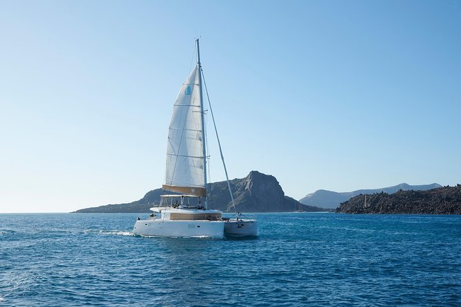 Santorini Platinum Catamaran Cruise with Meal, BBQ and Open Bar - Sunset, music, and the mood on board