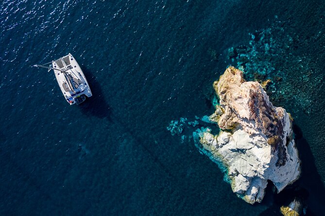 Santorini Platinum Catamaran Cruise with Meal, BBQ and Open Bar - Red Beach, White Beach, and the Akrotiri lighthouse
