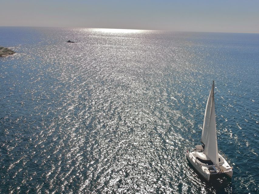 Santorini: Private All-In Catamaran Cruise, with Food|Drinks - From hotel pickup to Vlychada Port