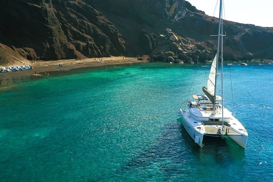 Santorini: Private Catamaran Tour with BBQ Meal and Drinks - Thirasia and the return to Thera