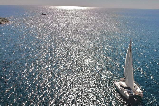 Santorini: Special Occasions Catamaran Cruise, All Inclusive - Hotel pickup and the practical start at Vlychada Port