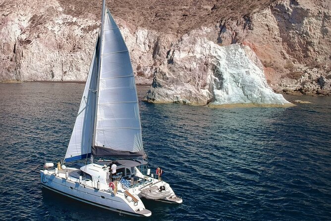 Santorini: Standard Small-Group Catamaran Cruise with Food/Drinks - Red Beach and the volcanic southern coast