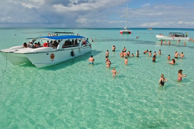 Saona Island Catamaran Adventure with Free Food and Transportation - The return catamaran and the party atmosphere