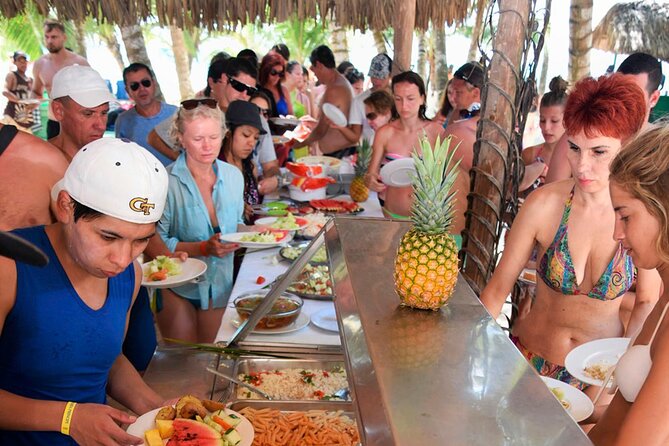 Saône Island from Punta Cana Catamaran, Natural Pool and Lunch - The catamaran ride brings the music and drinks