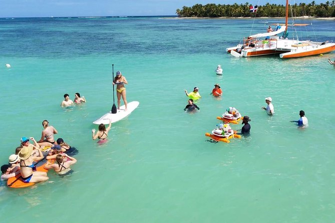 Small-Group Cruising and Snorkeling Catamaran Tour - Pickup, boarding, and the first stretch along shore