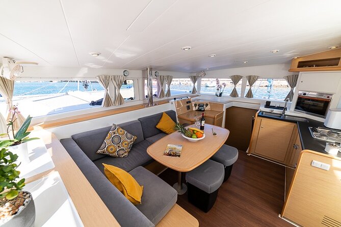 Small Group Santorini Catamaran Cruise with BBQ - Why Santorini looks better from a catamaran