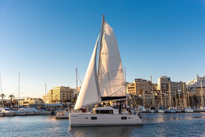 Small Group Santorini Catamaran Cruise with BBQ - White Beach, reached only from the sea