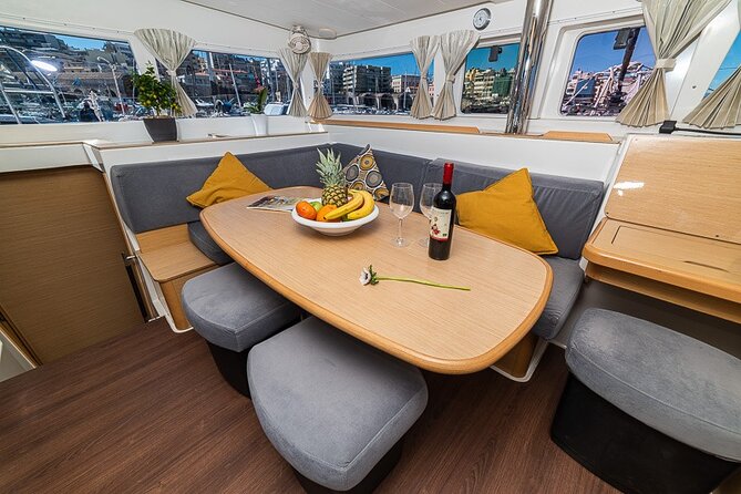 Small Group Santorini Catamaran Cruise with BBQ - Mesa Pigadia brings swimming and lunch together