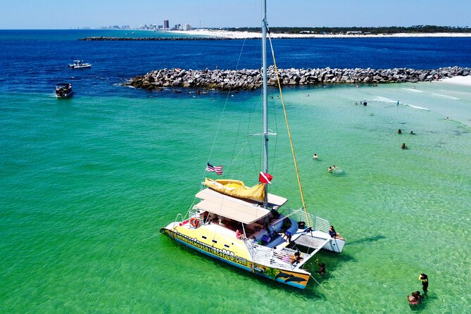 Snorkel & Dolphin Sightseeing Tour Aboard the Footloose - Shell Island snorkeling and beach time
