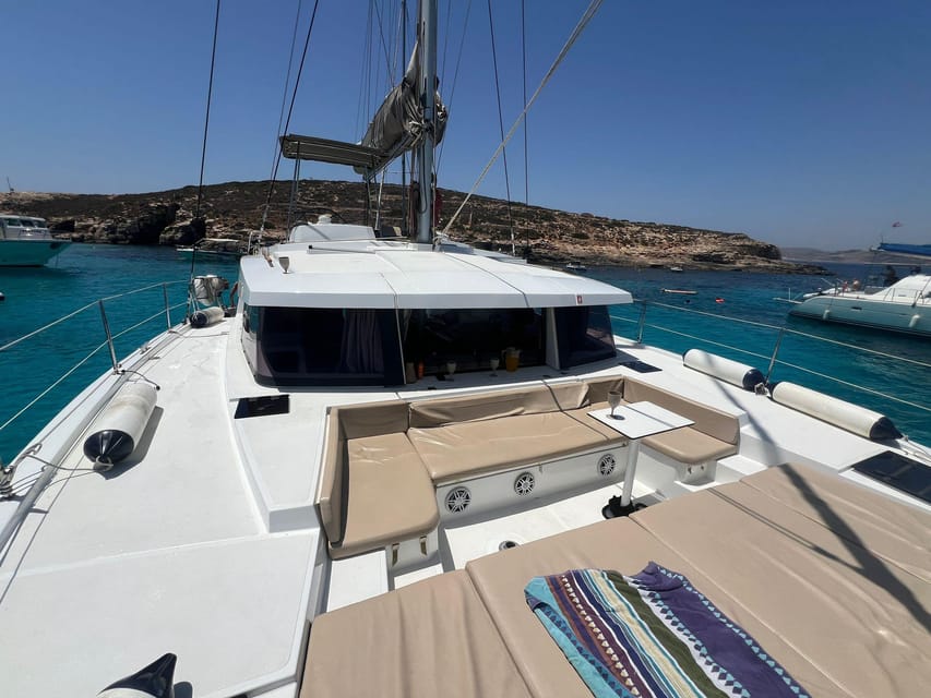 St. Paul's Bay: Half-Day Scenic Catamaran Tour with Drinks - Santa Maria Caves from the water