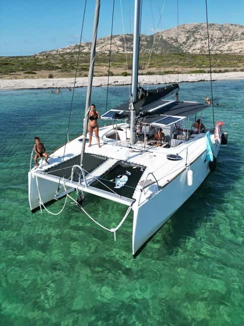 Stintino: full day tour catamaran Asinara Island - Sailing toward Asinara