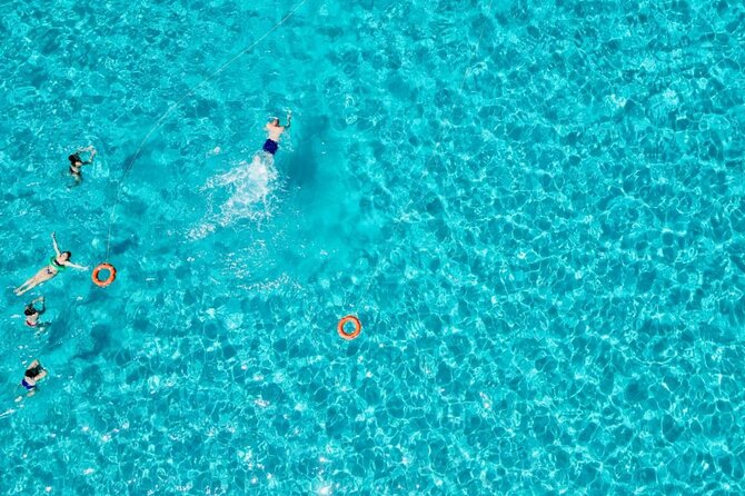 Stintino: Half-day catamaran tour to La Pelosa with aperitif - Finding the catamaran at Stintino harbor
