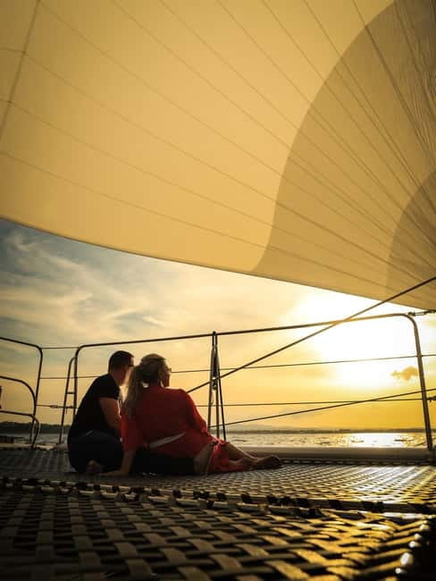Sunny Beach: Sunset Catamaran Cruise with Dinner & Prosecco - From the red London bus to the harbor
