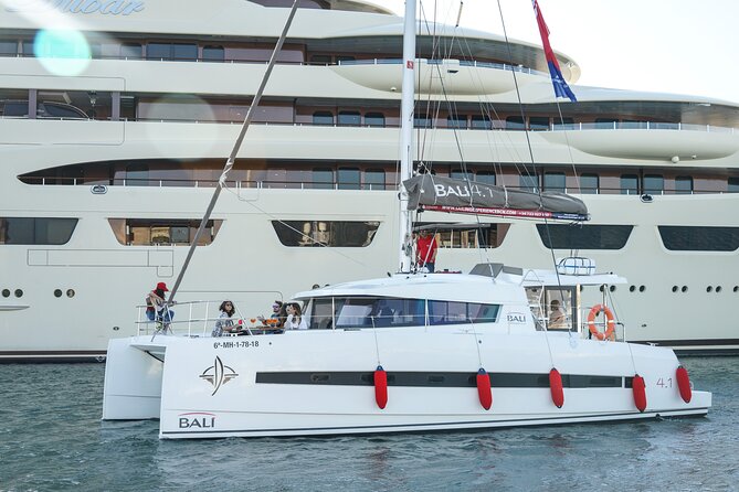 Sunset Catamaran: Small Group, Drinks, Snacks & Dinner Upgrade - Timing, meeting point, and cancellation