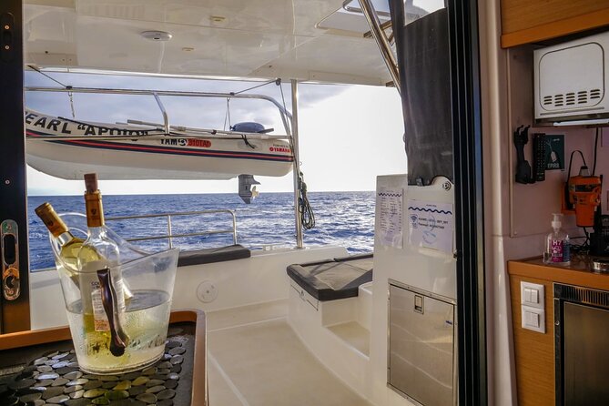 Sunset Catamaran Tour l Madeira Island - The swim stop in clear coastal water
