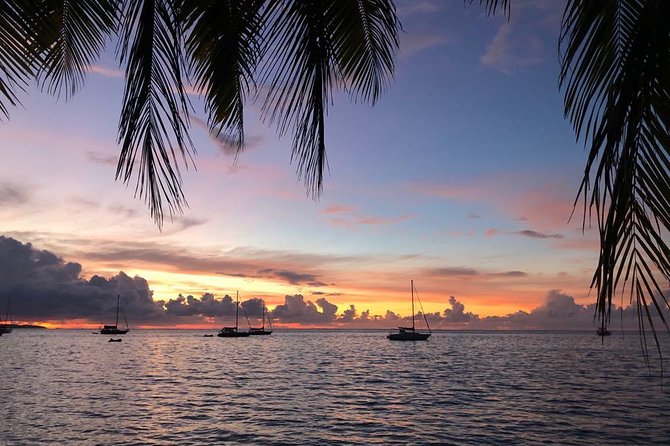Sunset Cruise : Moorea Sailing on a Catamaran named Taboo - Cocktails, fruit juice, and the final sunset view