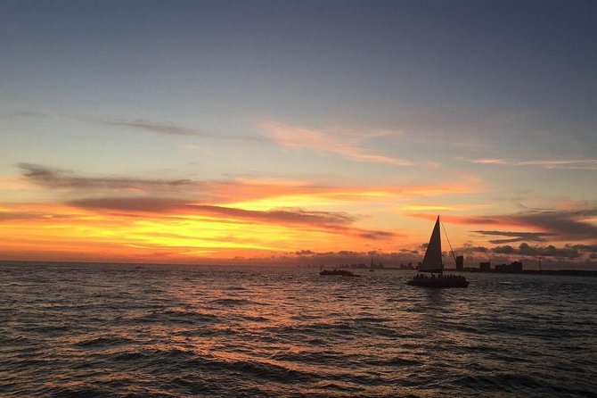Sunset Dolphin Sail Aboard the Footloose Catamaran - Music, drinks, and the evening mood
