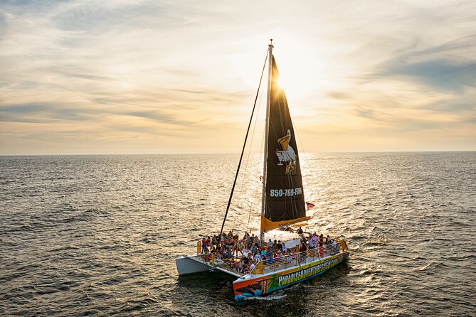 Sunset Dolphin Sail Aboard the Privateer Catamaran - A sunset sail built around dolphins, music, and an easy pace