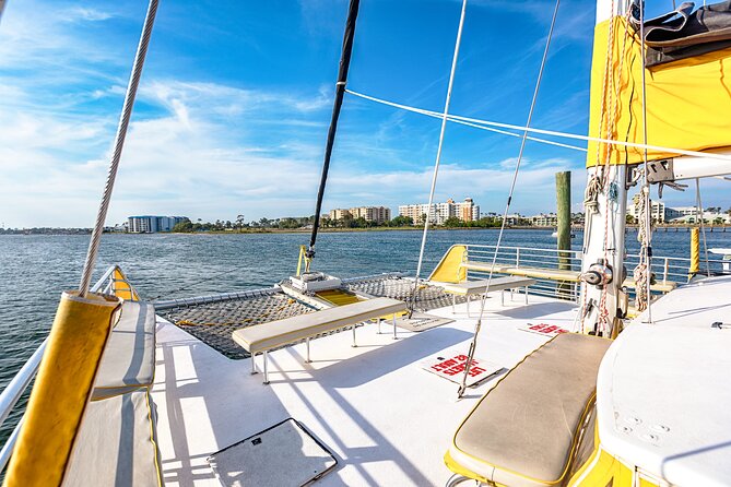 Sunset Dolphin Sail Aboard the Privateer Catamaran - Music, drinks, and the social side of the ride