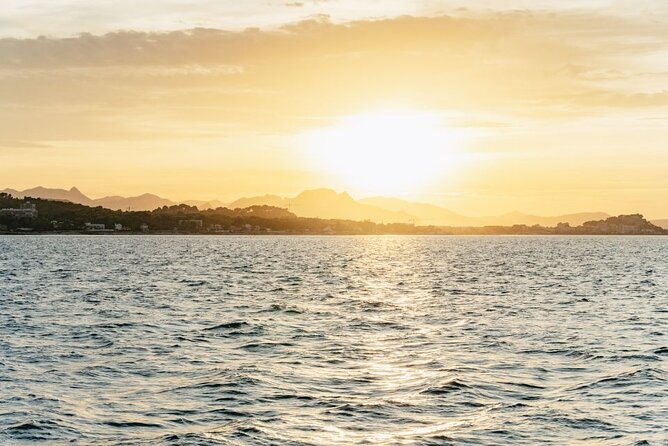 Sunset in Dénia from the Catamaran Mundo Marino - What happens after the sun goes down