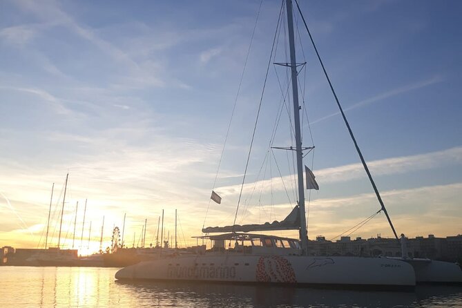 Sunset in Valencia from the Catamaran Mundo Marino - Boarding near Veles e Vents