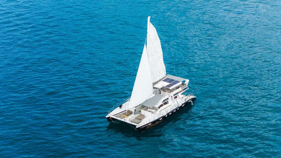 SUNWIND Phuket: Coral and Racha Islands Catamaran Tour - Coral Island: beach time, snorkeling, and a buffet lunch