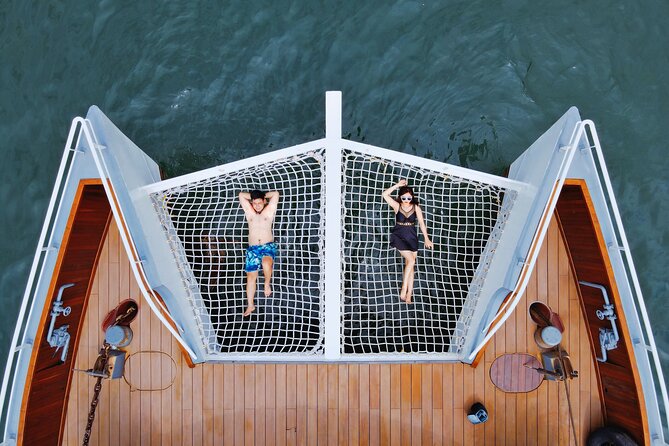 The Halong Catamaran Premium Day Cruise From Ha Long Bay - Sunset tea, fruit, and cakes on the return