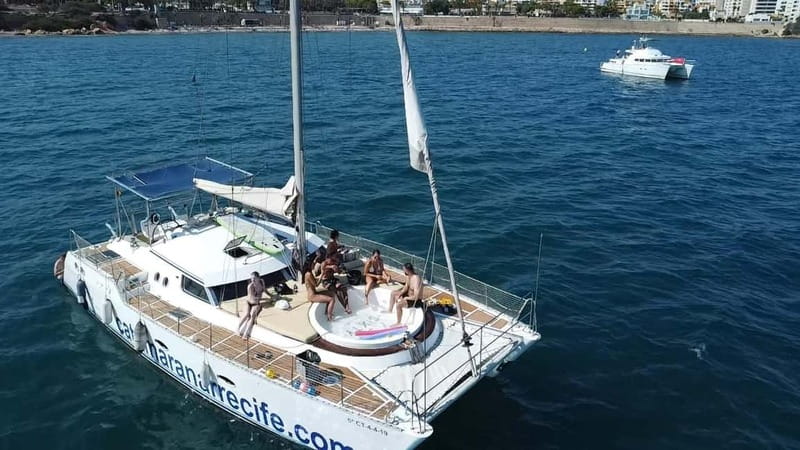 Torrevieja: Catamaran cruise and sunset with swimming - A short boat trip with a very wet personality