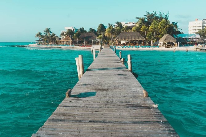 Tour in a Catamaran to Isla Mujeres with all included for the best price! - Weather, safety, and the age limits