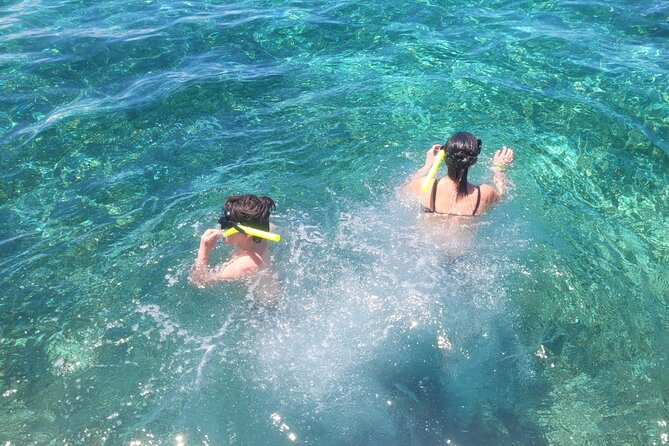 Tour to Cozumel by Catamaran with Snorkeling and Buffet Lunch - Playa Mía lunch and beach-club time