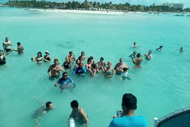 Trip to Isla Mujeres - Catamaran Unlimited Adventure from Playa del Carmen - Beach club lunch, pool time, and Playa Norte
