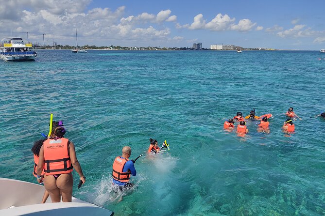 Trip to Isla Mujeres - Catamaran Unlimited Adventure from Playa del Carmen - The sunset ride and national open bar