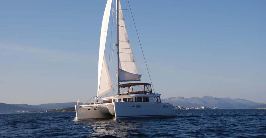 Tromsø: Fjord and Islands Luxury Catamaran Cruise - Fishing with the captain’s gear