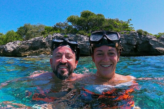 Unforgettable Catamaran Journey: Cancun to Isla Mujeres! - Snorkeling with the crew nearby