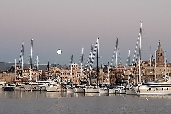 unique aperitif experience at sunset on a catamaran - A Sardinian aperitivo as the sun drops