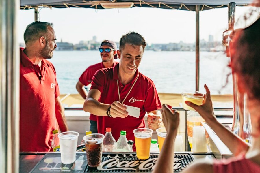 Valencia: Sunset or Daytime Catamaran Cruise with Drink - The drink, music, and onboard mood
