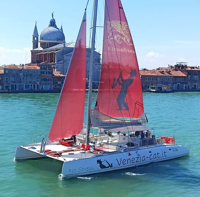Venice: Lagoon Catamaran Tour with Classical Music & Drinks - Finding the Catamaran at Riva dei Sette Martiri